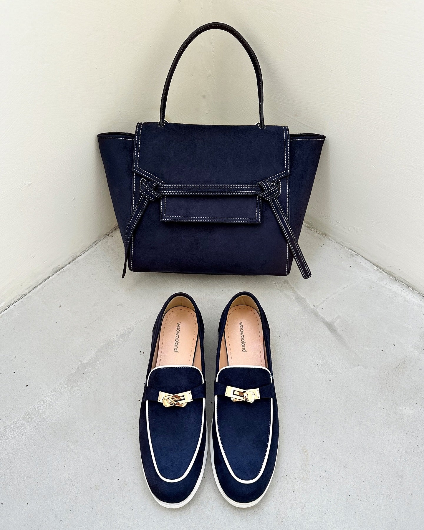 Blue stripes embellish elegant loafers