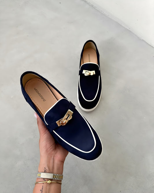 Blue stripes embellish elegant loafers