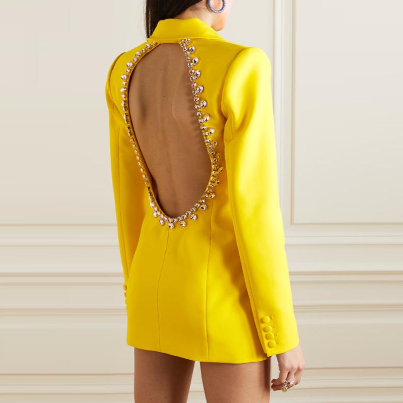 Women's suits with cut-out back and diamonds